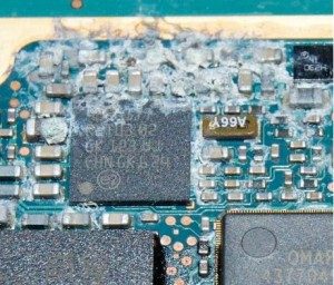 water corroded motherboard